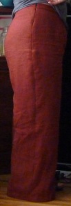 Side view of me wearing my orange trousers.